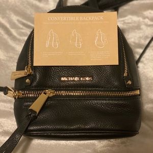Micheal Kors mini backpack! Black with gold detail